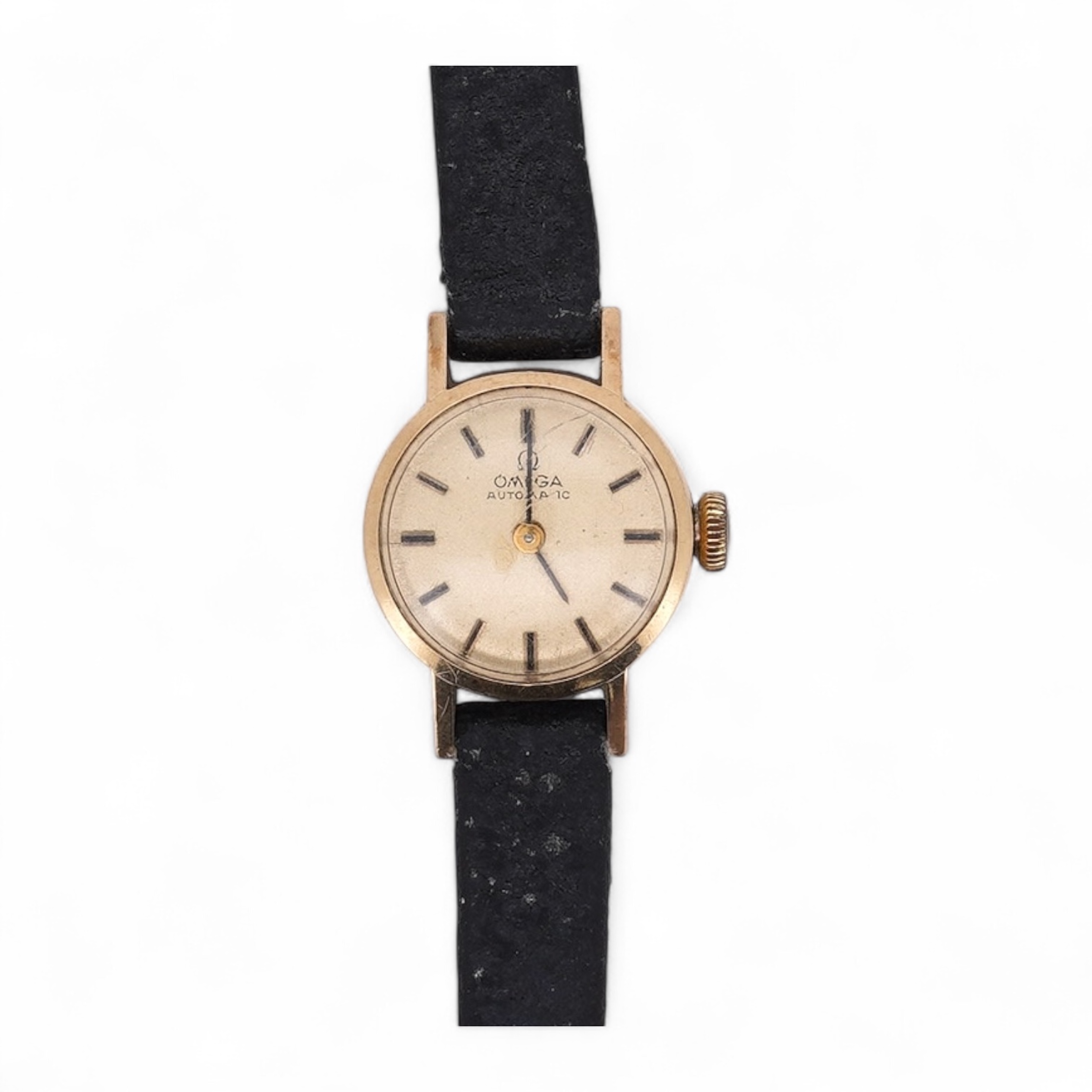 A lady's 9ct gold Omega Automatic wrist watch, on an associated leather strap, gross weight 11 grams. Condition - poor to fair